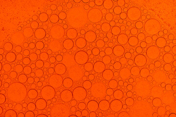 Macro microscope Red bubble texture, Close-up Green bubbles and drops oil background . blue green...