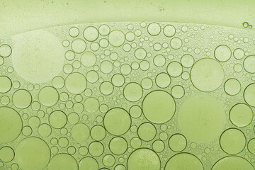 Macro microscope green bubble texture, Close-up Green bubbles and drops oil background . blue green...