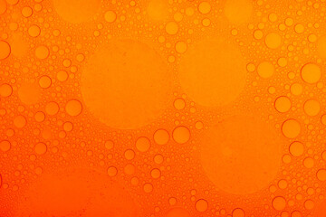 Macro microscope Red bubble texture, Close-up Green bubbles and drops oil background . blue green water bubbles, close up Red oil drop for cosmetic