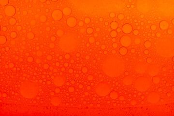 Macro microscope Red bubble texture, Close-up Green bubbles and drops oil background . blue green...
