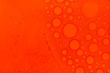 Macro microscope Red bubble texture, Close-up Green bubbles and drops oil background . blue green...