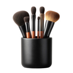 Assortment of makeup brushes standing upright in a black textured holder isolated on transparent background