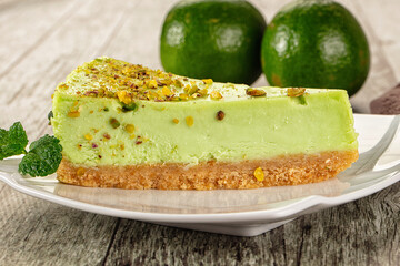 Green pistachio cheesecake served mint