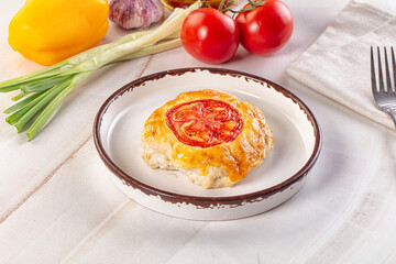 Chicken chop cutlet with cheese and tomato