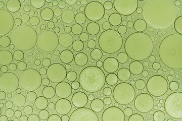 Macro microscope green bubble texture, Close-up Green bubbles and drops oil background . blue green...