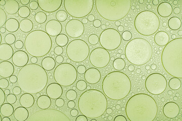 Macro microscope green bubble texture, Close-up Green bubbles and drops oil background . blue green...