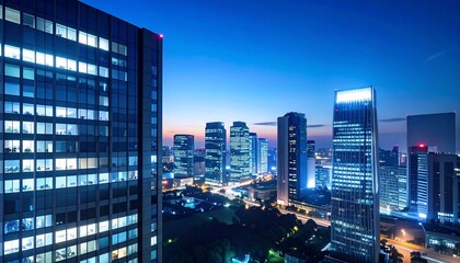 Nightscape showcasing modern skyscrapers, depicting urban illumination at twilight