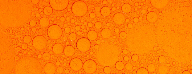 Macro microscope Red bubble texture, Close-up Green bubbles and drops oil background . blue green...
