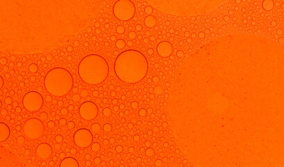 Macro microscope Red bubble texture, Close-up Green bubbles and drops oil background . blue green...