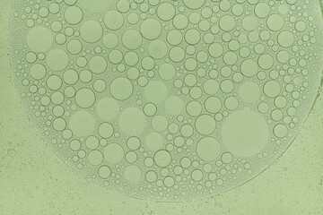 Macro microscope green bubble texture, Close-up Green bubbles and drops oil background . blue green...