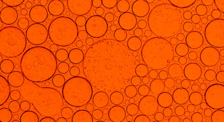 Macro microscope Red bubble texture, Close-up Green bubbles and drops oil background . blue green...
