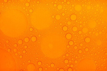 Macro microscope Red bubble texture, Close-up Green bubbles and drops oil background . blue green...