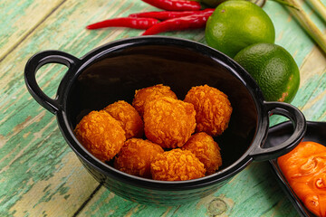 Fried crispy yellow cheese balls