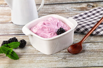 Organic tasty dairy yoghurt with blackberry