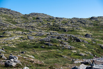 landscape Russian North view in the tundra with a mountain river and a lake in the mountains