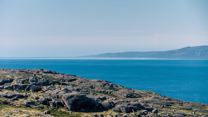 landscape Russian North view in the tundra with a mountain river and a lake in the mountains