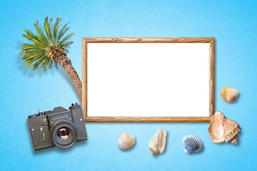 photo frame retro camera palm tree and shells on blue background