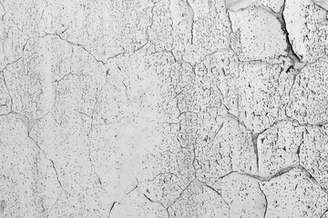 Texture of Time: An aged and weathered wall, its surface intricately etched with the passage of...