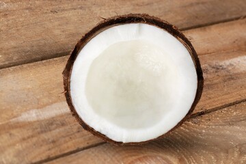 Fresh cracked or cut coconut on desk