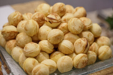 mini waffle cakes served on a large plate.