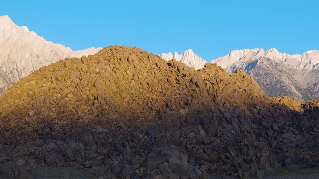 Cinematic aerial shot of Mt. Whitney at sunrise in Sierra Nevada Mountains, California