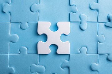 Single white puzzle piece in center of light blue puzzle