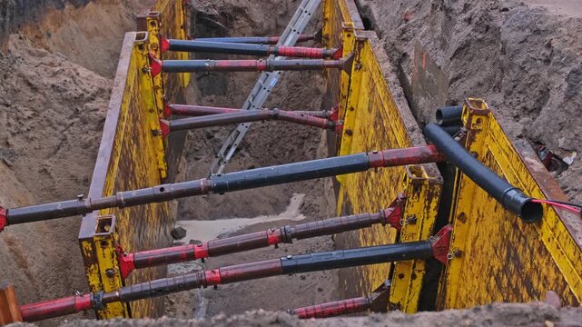 Earthworks Industrial Trench Shoring Walls Supported by Hydraulic Piston Beams Preventing Collapse