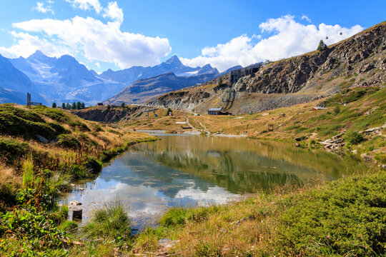 View of Leisee lake at summer on the Five Lakes Trail in Zermatt, Switzerland