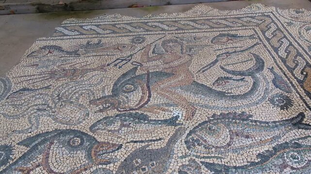 Etruscan mosaic depicting the god of the seas in Luni Etruscan village