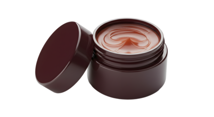 Open jar of brown face cream with heart-shaped swirl on surface, moisturizing beauty product for skincare and self-care routines
