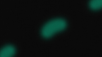 Three soft glowing green shapes on black