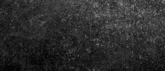Black rough textured surface background for web banner page template design. creates oppressive and somewhat gloomy mood.