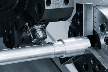 Metal machine tools industry. CNC turning machine high-speed cutting is operation.