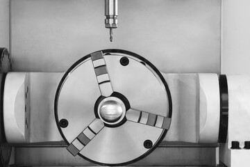 Metal machine tools industry. CNC turning machine high-speed cutting is operation.