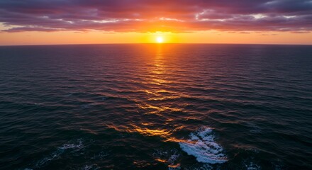 Obraz premium 燃える夕日 海面を照らす 美しい光線 波穏やか (Moeru yuhi umimen wo terasu utsukushii kousen nami odayaka) Translation: Burning sunset, beautiful light rays illuminating the sea surface, calm waves.. AI Generated