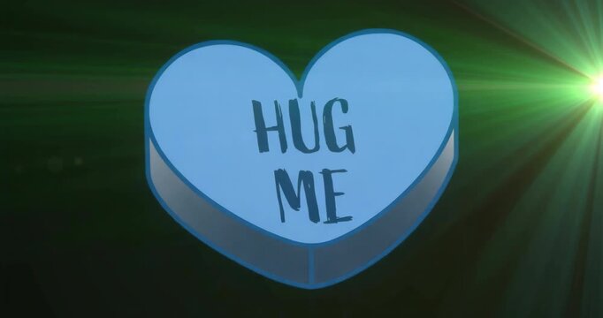 Green lens flare sweeping blue heart pulsing fading shrinking regrowing HUG ME text inviting hug