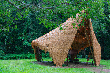 Park Pavilion with Leaf Roof in Green Garden