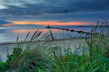 Sunset over the Baltic Sea beach in Gorki Zachodnie, Gdansk. Poland