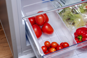Refrigerator drawer with fresh vegetables. Vegetable drawer