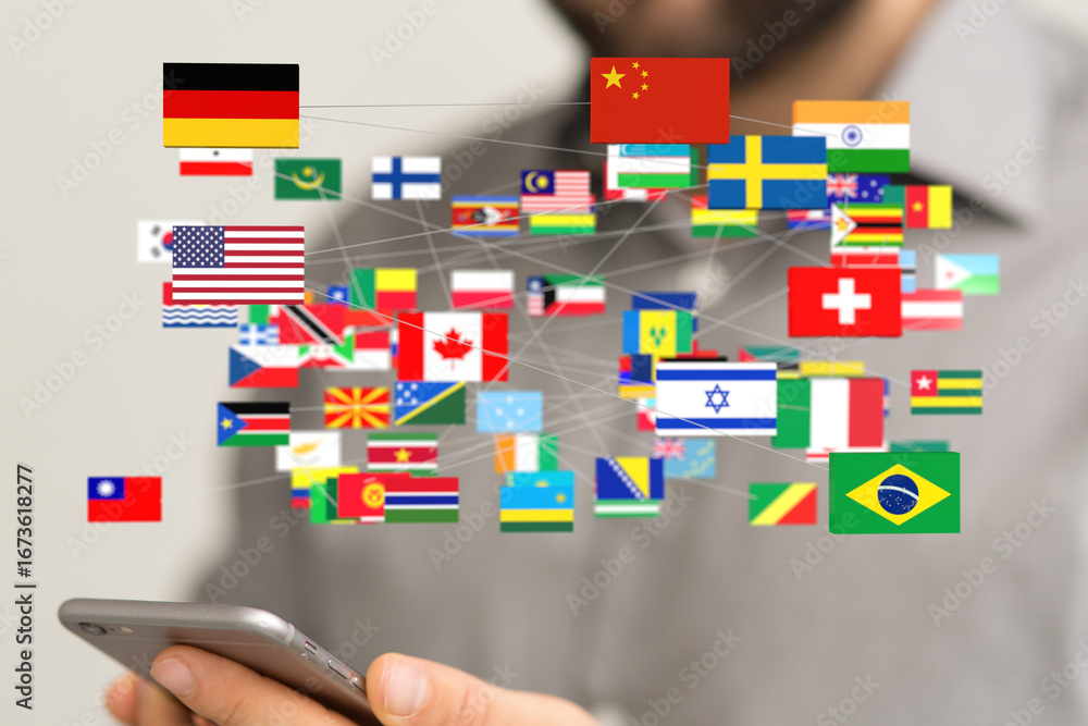 Poster person holding smartphone displaying interconnected world flags, symbolizing global communication an