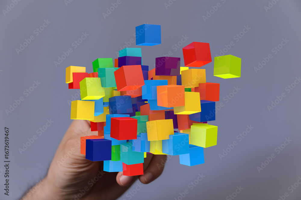 Poster abstract image of colorful cubes in a hand, symbolizing innovation, creativity, and problem-solving.