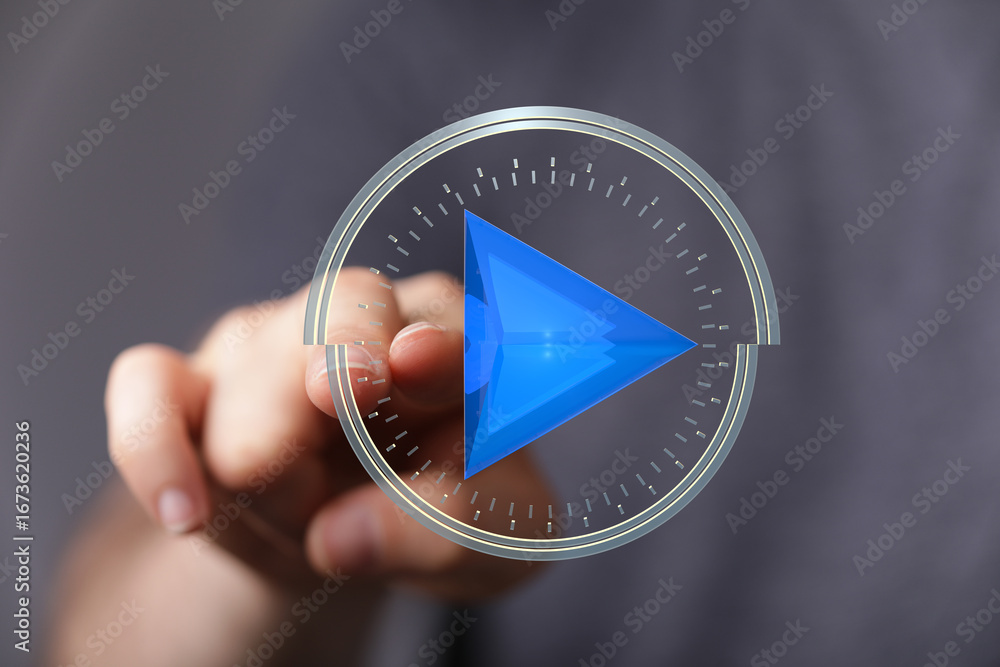 Poster close-up of a hand interacting with a digital play button interface. modern technology concept.
