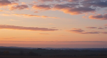 Naklejka premium Peaceful Sunset Over Rural Landscape