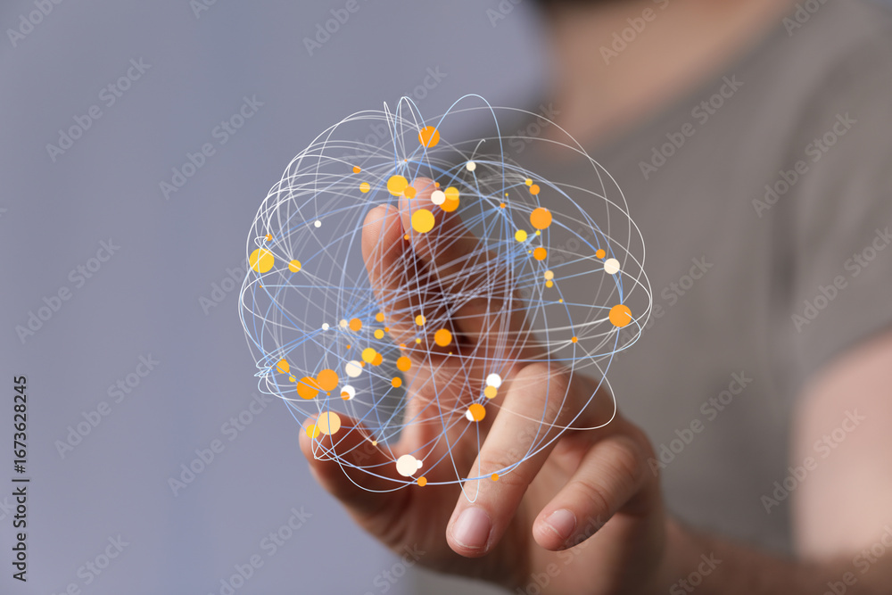 Poster abstract image depicting a hand interacting with a digital network sphere. perfect for technology, c