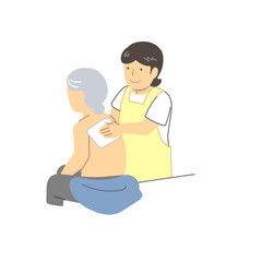 介護：体を拭く介助高齢者