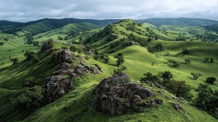 Green hills and rocky outcrops landscape