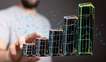 Stock photo of hand interacting with 3D bar graph, illustrating data analysis and business growth.