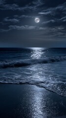 Fototapeta premium Moonlight reflects on the ocean waves at night, creating a serene atmosphere