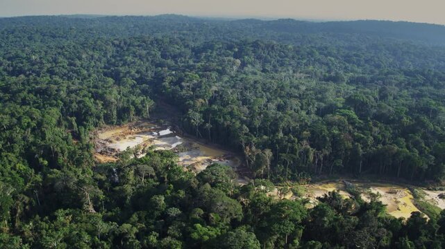 Congo &ndash; 4K Drone Aerial of Gold Mining Industry in Rainforest at Sunset