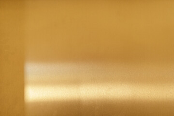 High-resolution image of a golden metallic texture. Perfect for backgrounds, websites, and design projects.
